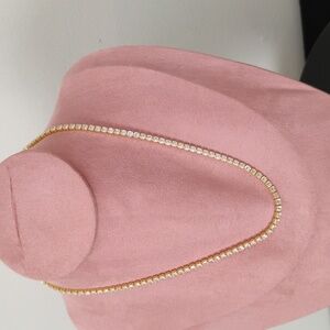 18 kt GF Tennis necklace 16" L x 1/8" W. Rhodium plated.